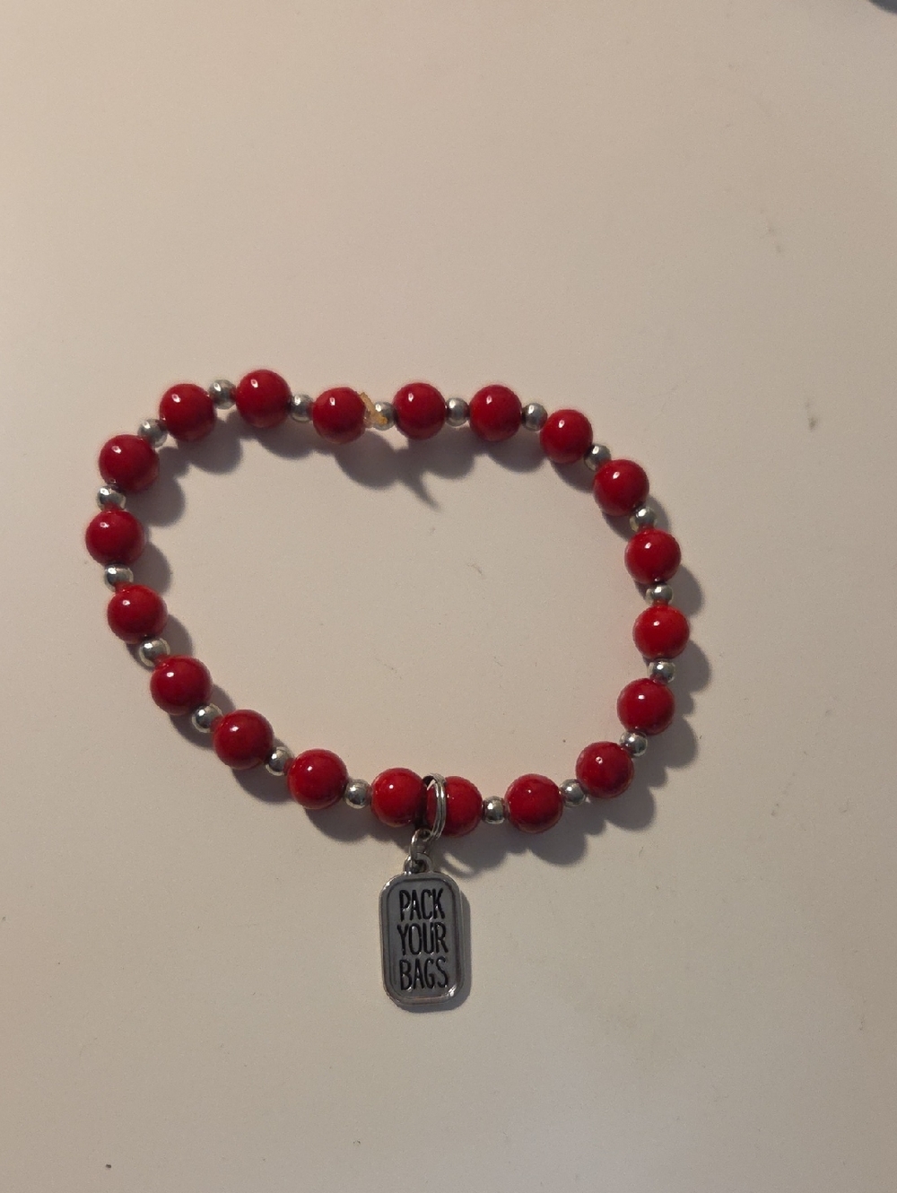 Red Beaded Stretch Bracelet with 'Pack Your Bags' Charm Handmake